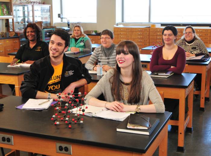 Students sit in an MCC biology classroom