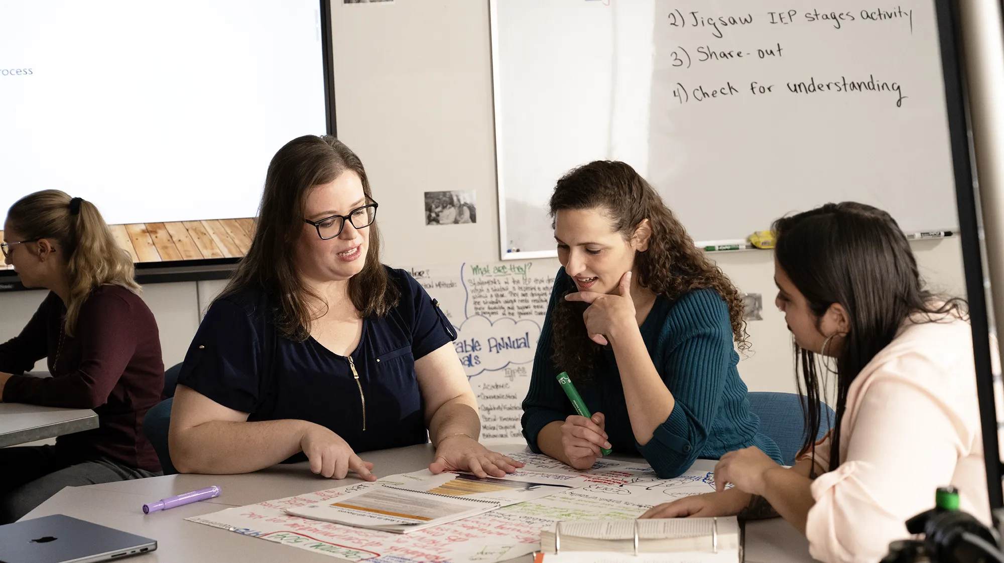 a professor helping a student