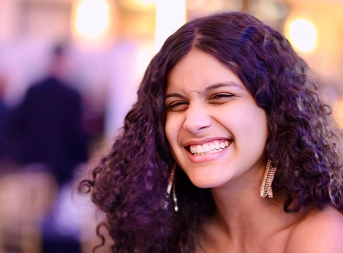 a woman smiling at the camera