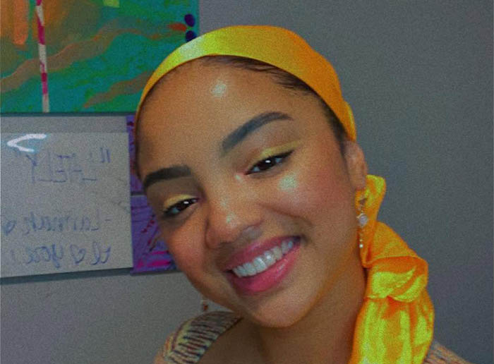 a student smiling