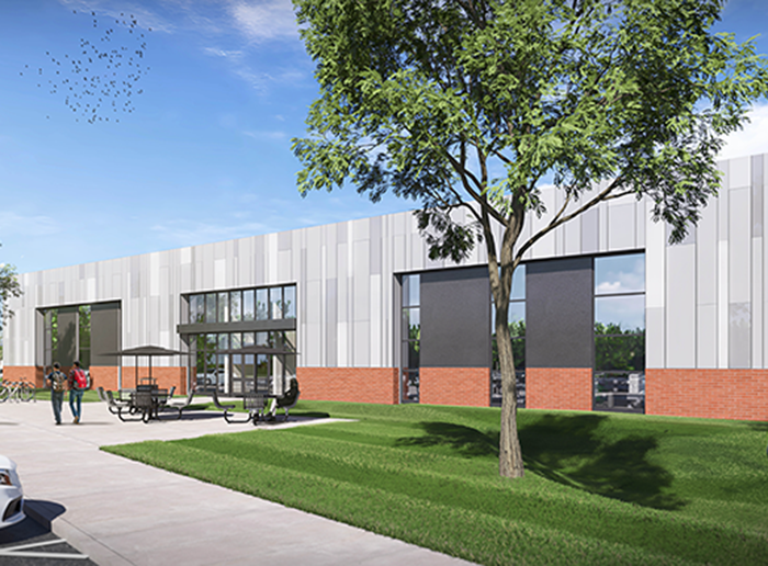 Exterior rendering of MCC's Sydor Optics Advanced Technology Center featuring a modern building with large windows, landscaped grounds, and outdoor seating.