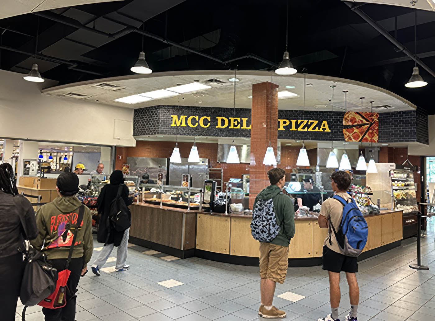 Two Monroe Community College students study together at Deja Brew, a campus coffee shop.